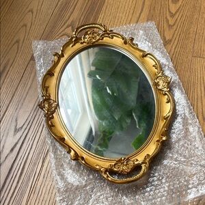 Vintage-Inspired Gold Oval mirror